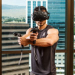 VR Fitness Insider – Vive controllers in urban apartment.