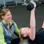 personal trainer with client