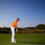 rickie fowler hitting ball